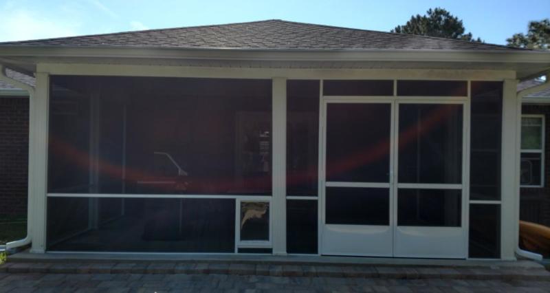 Screened in porch with double door and pet door