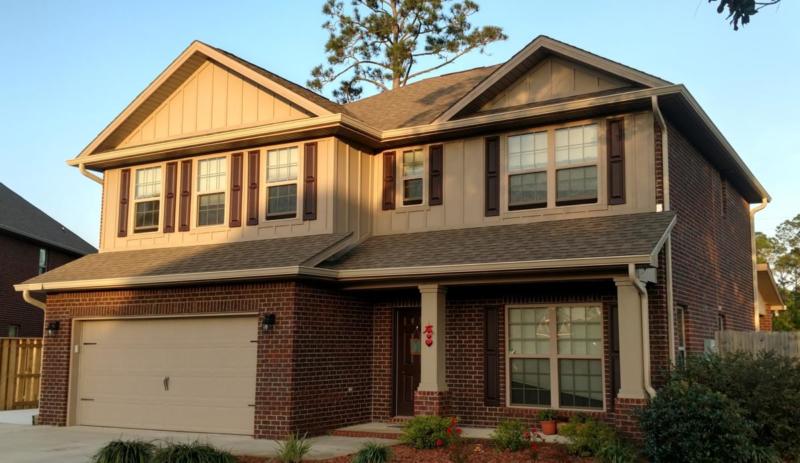 Color matched wicker gutters on 2 story house