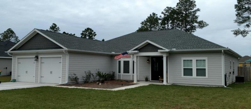 White aluminum gutters and downspouts